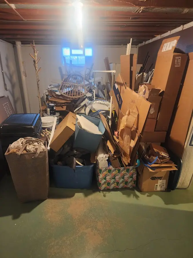 Roll-off dumpster container at job site for 15 Yard Dumpster Rental in Rockford